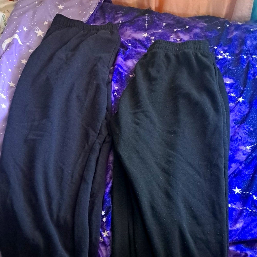 Two black sweatpants